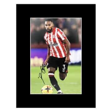 Signed Rico Henry Photo Display 16x12 - Brentford Icon Autograph